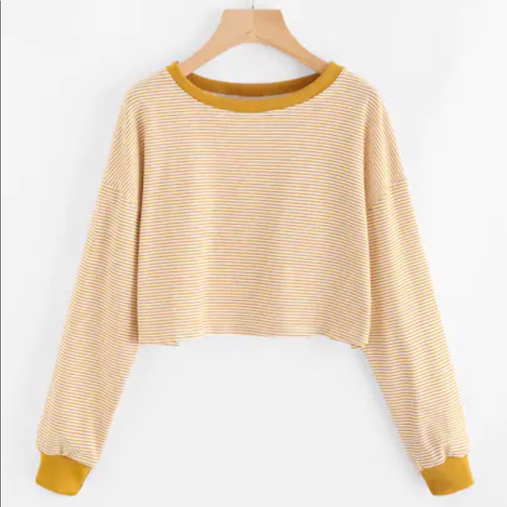white a yellow long sleeve cropped top
